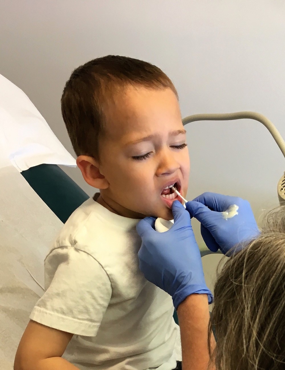 Child receiving oral care